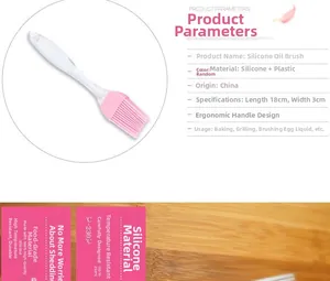 Pink silicone brush head with white handle for baking and BBQ, size 18x3cm detailed view