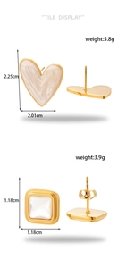 Detailed view of heart and square gold earrings with marble glaze and pearl shell