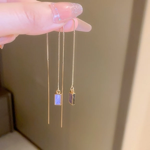 Elegant gold drop chain earrings featuring purple rectangular resin pendants with mica texture