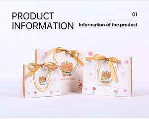 Three sizes of cartoon bear gift bags with golden silk ribbon handles and floral decor