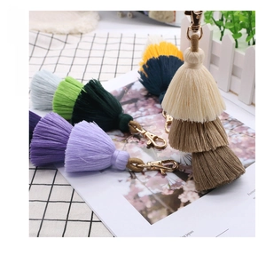 Detailed multi-layer cotton tassel keychain with gold lobster clasp for bag decoration