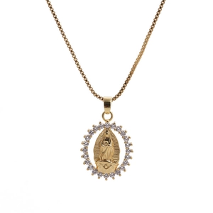 Detailed close-up of Virgin Mary gold pendant with sparkling zircon halo and box chain