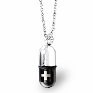 Polished silver and black capsule pendant necklace with cross symbol on a steel chain