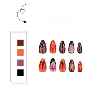 Detail of 10pcs almond press-on nails with metal rose, cross designs and sparkling rhinestones