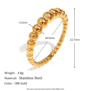 Detailed view of 18K gold plated stainless steel ring with beaded texture and dimensions