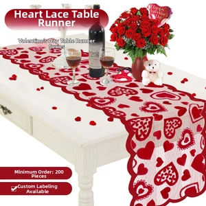 Detailed red lace table runner with heart patterns and wavy edges for Valentine's Day