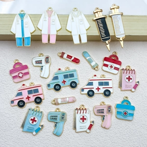Detailed view of 18 medical-themed colorful enamel pendants for DIY jewelry making