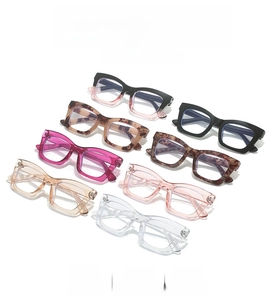 Detail view showing eight colorful stylish square frame glasses with anti-blue light lenses