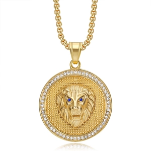 Macro detail of gold plated stainless steel lion head pendant with blue and clear crystals
