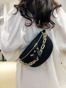 Chic black crossbody chest bag for women with gold chain decoration and stylish tassels
