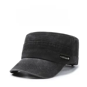 Detail of black washed cotton cadet cap with metal sport badge and reinforced stitching