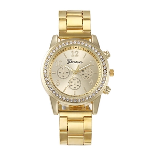 Montre à quartz luxe dorée avec lunette en strass et bracelet métallique pour femme