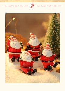Miniature resin Santa Claus figurines set for festive Christmas tabletop scenery and decor