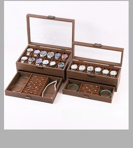 Macro detail of vintage wooden watch box with bronze lock and velvet storage slots