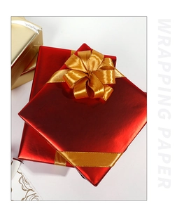 Matte red metallic gift wrapping paper with golden silk ribbon and Just for You bow