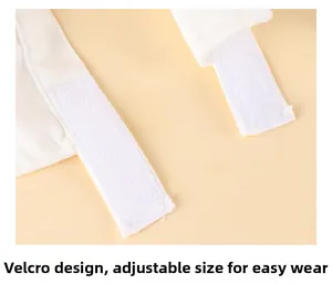 Close-up of adjustable white pet necktie with hook and loop fastener for a secure fit