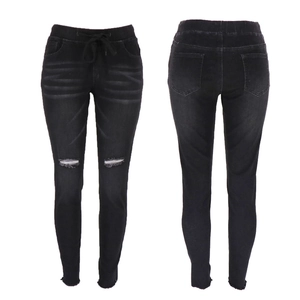 Jean skinny noir délavé avec taille à cordon et détails déchirés aux genoux