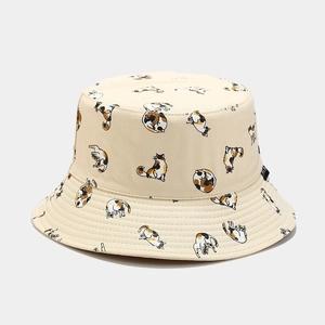 Close-up of beige cotton bucket hat with cute calico cat patterns and reinforced stitching