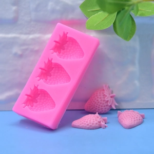 Three-cavity pink silicone strawberry mold for DIY cake decorating and soap making