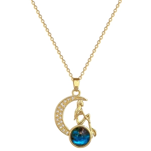Luxurious gold star moon necklace featuring mermaid pendant with zircon stones and teal gem