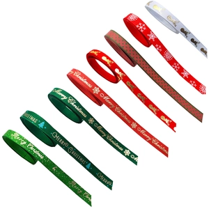 Close-up of Christmas ribbons with festive patterns for gift wrapping and DIY crafts
