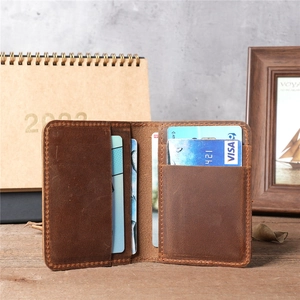Vintage brown leather card holder featuring multiple slots and bi-fold business design