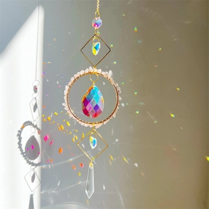 Hanging crystal suncatcher with natural pink stone chips and rainbow prism drop pendant