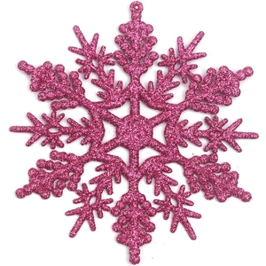Close-up of a 10cm bright pink glittery snowflake ornament for Christmas tree decor