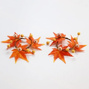 Set of two realistic maple leaf candle rings with orange foliage and golden berries