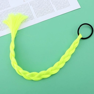 Detailed view of children's yellow braided hair extension with black elastic band