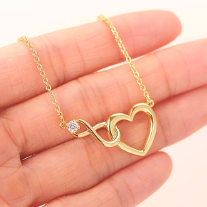 Gold infinity heart necklace for women featuring a minimalist interlocked zircon pendant