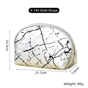 Detailed view of marble pattern shell makeup bag with size dimensions and silver zipper