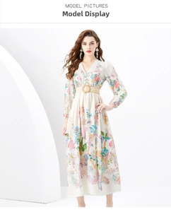 Detail of V-neck floral maxi dress with pleated lantern sleeves and woven belt
