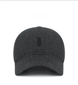 Front detail of men's winter sports cap with textured grey fabric and small sport tag