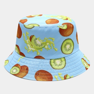 Detail of light blue bucket hat with vibrant kiwi fruit print and clean stitching