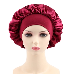 Detail of burgundy satin bonnet showing elastic wide band and soft silky texture
