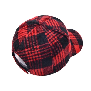 Detailed back view of red and black buffalo plaid baseball cap with adjustable buckle