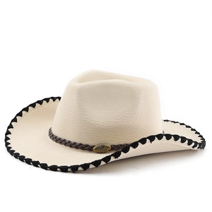 Classic beige western cowboy hat with bull head ornament and black stitched brim