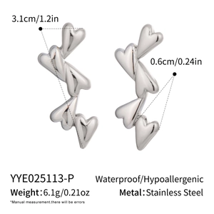 Detail view of heart-shaped stainless steel earrings with length and weight specifications