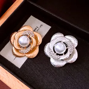 Elegant gold and silver camellia flower brooches with pearls and rhinestones in gift box