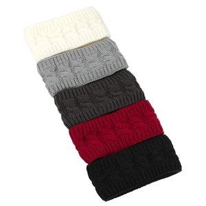 Pile of five colorful chunky cable knit headbands featuring warm fleece lining details