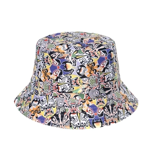 Detailed flat lay of a cotton bucket hat featuring colorful Beijing Opera masks pattern