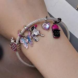S925 silver charm bracelet featuring pink butterfly, heart, and lipstick pendants