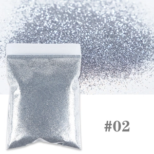 Macro shot of silver fine glitter powder #02 in clear bag for nail art and decoration