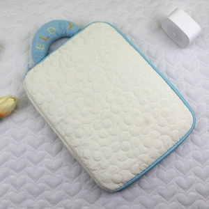 Quilted floral laptop sleeve in cream with light blue handle and MELODY embroidery detail