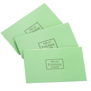 Three premium light green silver polishing cloths for jewelry cleaning on white background
