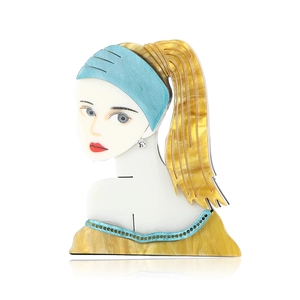 Creative acrylic brooch featuring a blonde girl portrait with blue headscarf and yellow dress