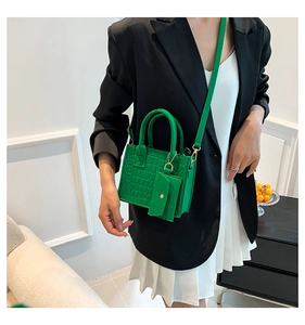 Green crocodile pattern handbag with matching mini purse and long shoulder strap