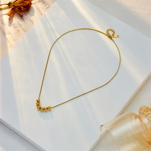 Minimalist gold beaded necklace with titanium steel chain and S925 sterling silver tag