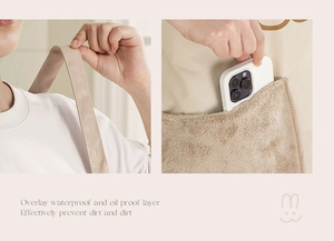 Detail of waterproof apron with absorbent plush pockets and wide shoulder straps